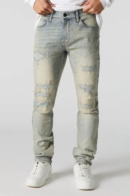 Men's Low - Rise Jeans in a Light Wash for a Casual and Youthful LookLight Vintage Wash Distressed Skinny Jean