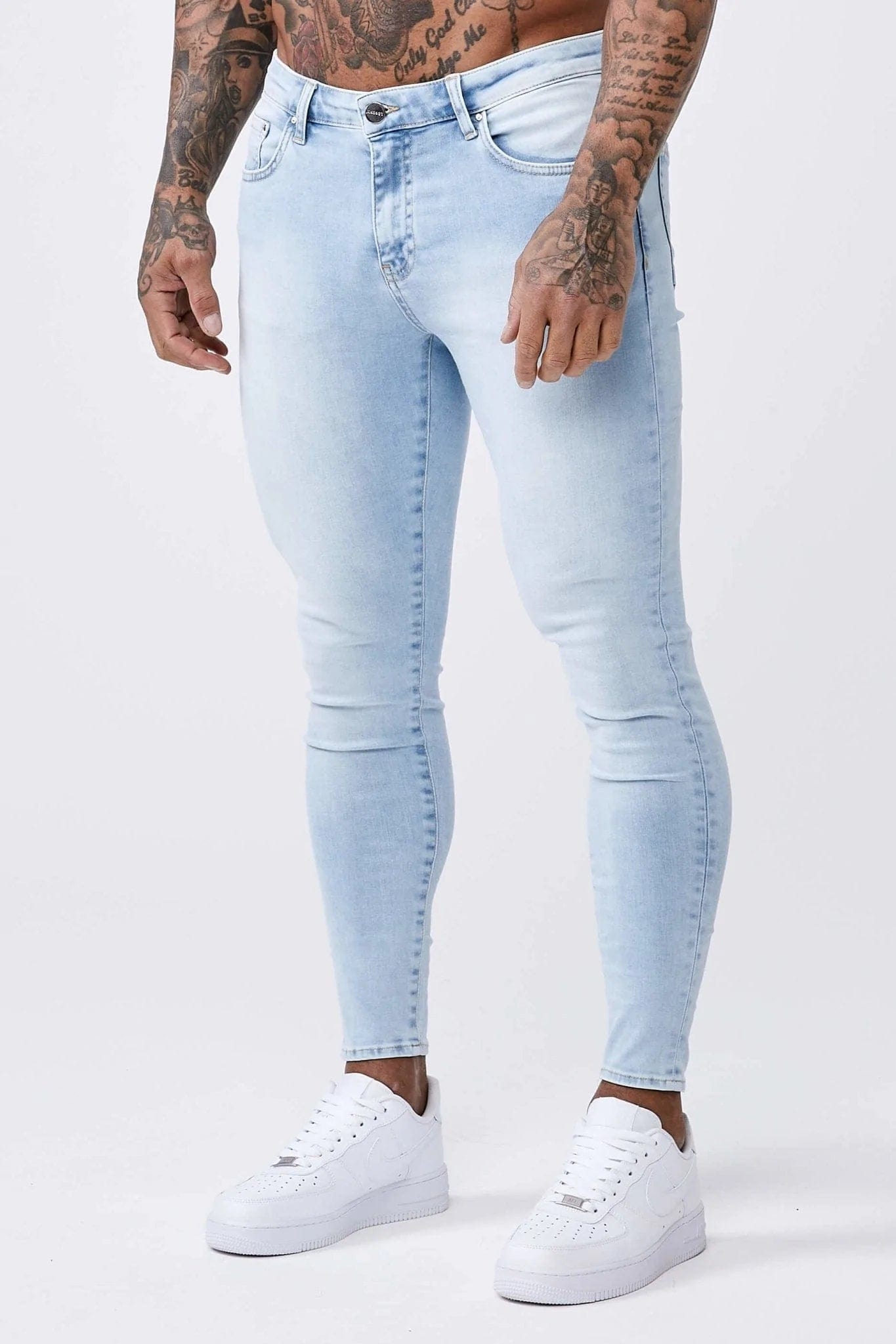 Men's Jeans with a Frayed Hem for a Casual and Effortless StyleSKINNY FIT JEANS - PALE BLUE WASH