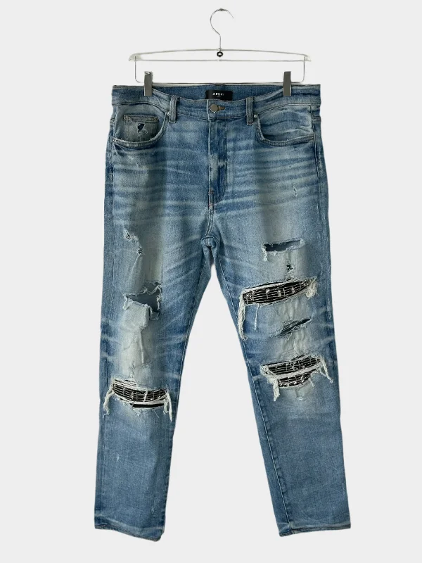 Plus Size Men's Relaxed Fit Jeans with a Faded Wash for a Vintage - Inspired LookRipped Jeans