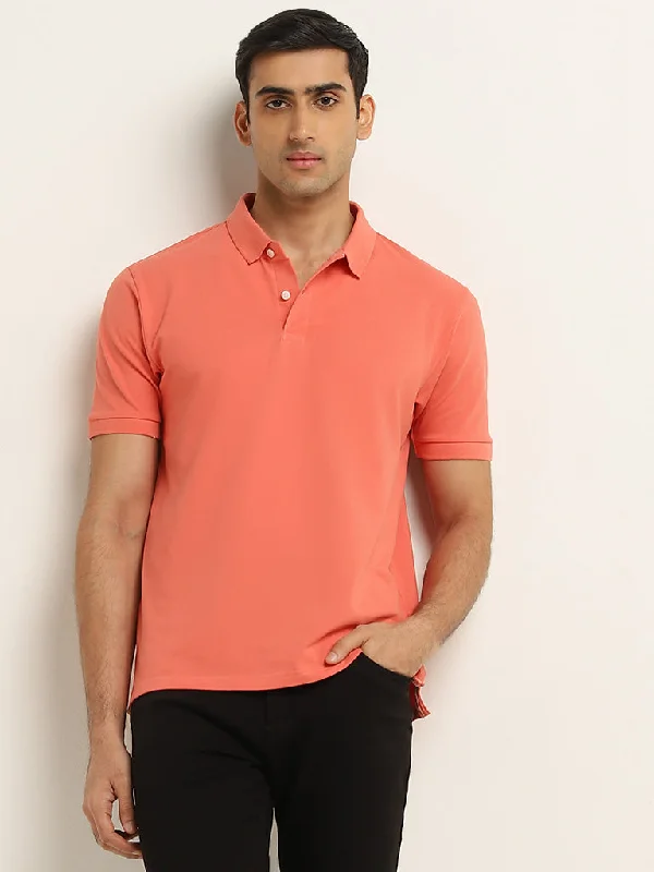 Men's color - block polo shirts with a bold fashion statementWES Casuals Coral Solid Slim Fit Polo T-Shirt