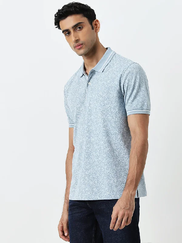 Men's breathable cotton blend polo shirts for summer outingsWES Casuals Dusty Blue Floral Printed Relaxed-Fit Polo T-Shirt